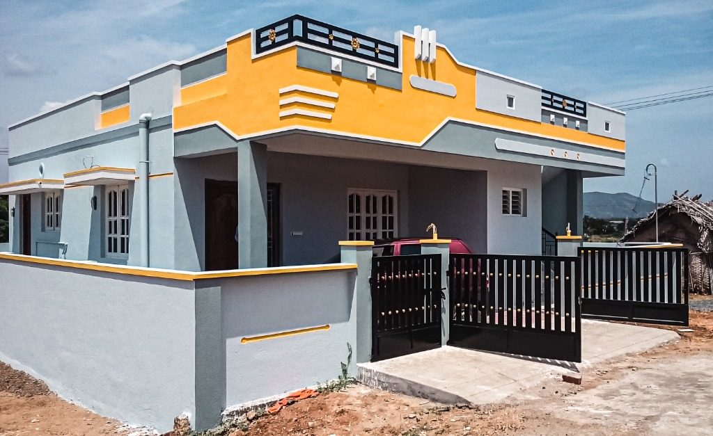 Contemporary single-floor home with ochre parapet built by New Heights Builders